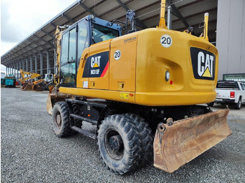 Колёсный экскаватор CATERPILLAR M318F