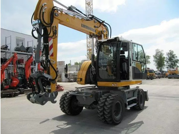 Колёсный экскаватор LIEBHERR A 913