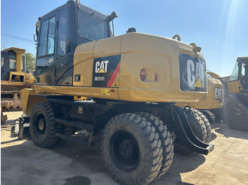 Колёсный экскаватор CATERPILLAR M318