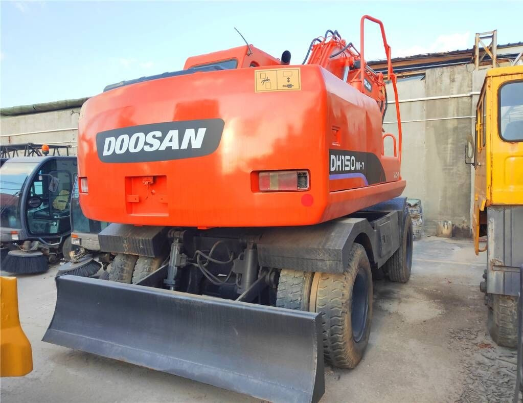 Колёсный экскаватор Doosan DH150W-7: фото 8