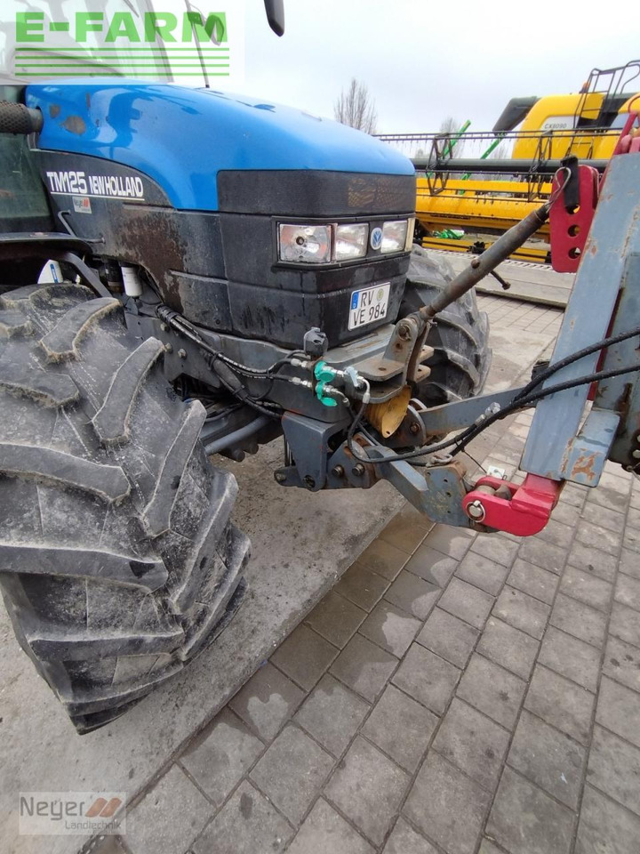 Трактор New Holland tm 125: фото 12